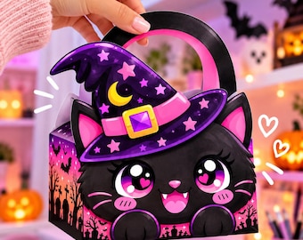 May include: A black cat treat box with a handle, featuring a purple witch hat with a yellow crescent moon and pink stars. The cat has large pink eyes with heart-shaped pupils, a pink nose, and a smiling mouth. The box sides show a graveyard scene.
