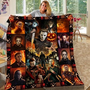 May include: A rectangular fleece blanket featuring a collage of multiple scenes depicting the horror character Michael Myers from the Halloween film series, including various portraits, a jack-o'-lantern, and fiery orange and black patterns.