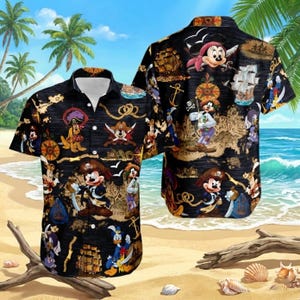 May include: Black short-sleeved button-down shirt featuring a pirate-themed design with cartoon characters, ships, and maps. The shirt has a white collar and is set against a beach backdrop with palm trees and ocean waves.