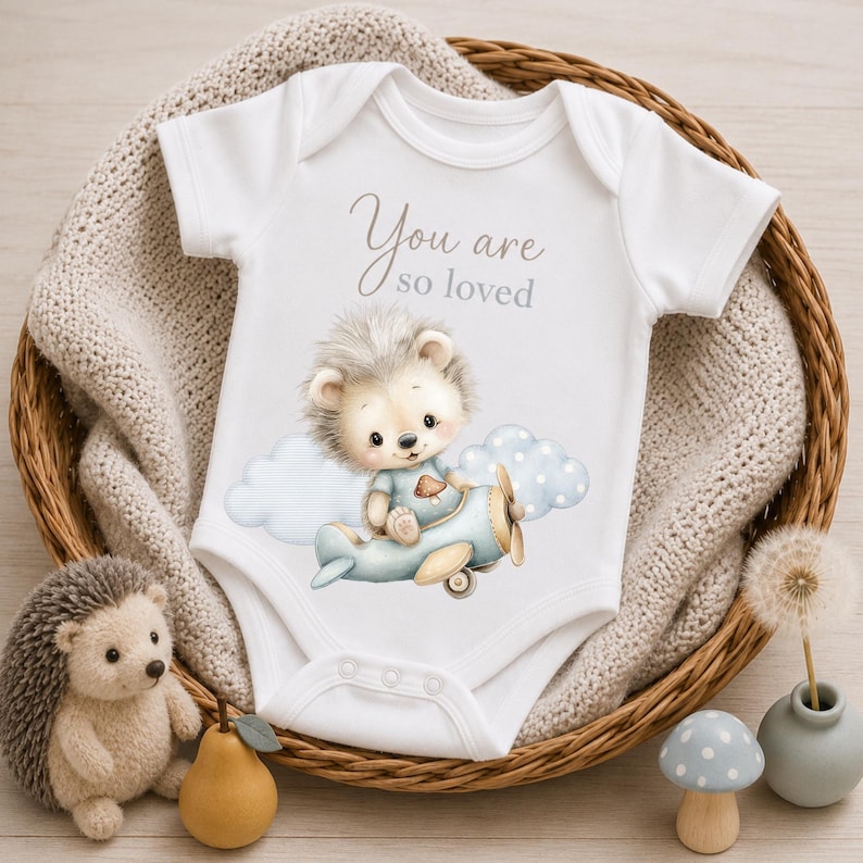 Baby bodysuit design featuring watercolor hedgehog clipart for woodland nursery themes