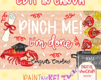 May include: A digital mockup design with the text "EDIT IN CANVA" and "PINCH ME! I'M DONE!" in red and white. The design includes a graduation cap, lobster, scroll, and a pot with food. The text "Congrats Caroline!" is also included.