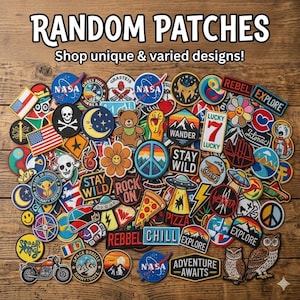 May include: A large collection of embroidered fabric patches featuring diverse designs including NASA logos, skulls, flowers, mountains, UFOs, pizza slices, and text like "STAY WILD," "ROCK ON," "CHILL," and "ADVENTURE AWAITS" arranged in a dense cluster.
