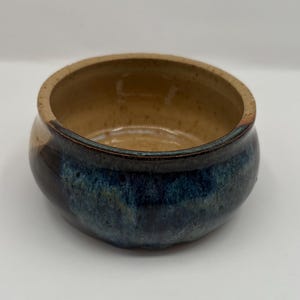 vintage studio pottery bowl  two tone glaze in browns blue and tan signed Kristine 4.5”w