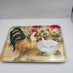 Vintage  decorative tray featuring a rooster and hen design made of thick plastic 11.5” Lx 8.5” W farmhouse decor county decor rooster lover