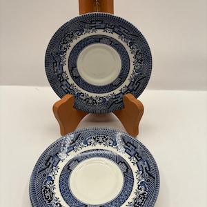 Vintage Churchill saucers featuring the blue willow design set of (4)