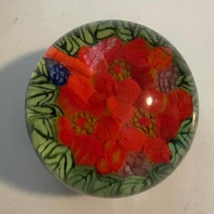 Vintage glass paperweight large 2.5” H  featuring fed floral design
