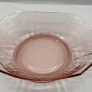Pink depression glass bowl in a hexagon shape with two handles serving bowl 11”Lx7”W