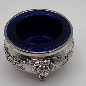 Antique sterling silver open salt cellar with a cobalt blue glass insert late 19 century 2.25 W x 1.5” H