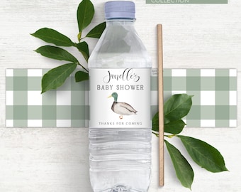 May include: Water bottle label with a green and white checkered background. The label features a watercolor illustration of a mallard duck and the text "Janelle's Baby Shower" with the words "Thanks for coming" at the bottom.
