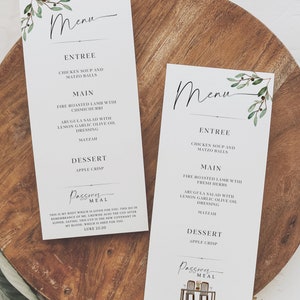 Puede incluir: Dos tarjetas blancas con un diseño de hojas verdes y texto negro. Las tarjetas están tituladas "Menú" y enumeran los entrantes, los platos principales y los postres para una comida de Pascua. El texto incluye "Sopa de pollo y bolas de matzá", "Cordero asado al fuego con chimichurri", "Ensalada de rúcula con aderezo de aceite de oliva, limón y ajo", "Matzá" y "Tarta de manzana".