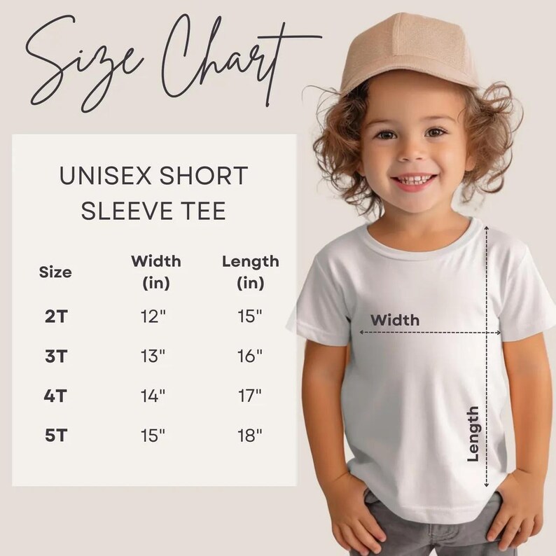 a little girl wearing a white shirt and a brown hat