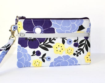 Poignet à double fermeture à glissière de 7 po. 2 poignets à fermeture éclair. Double pochette zippée avec sangle. Double pochette à fermeture éclair en fleurs violettes et jaunes