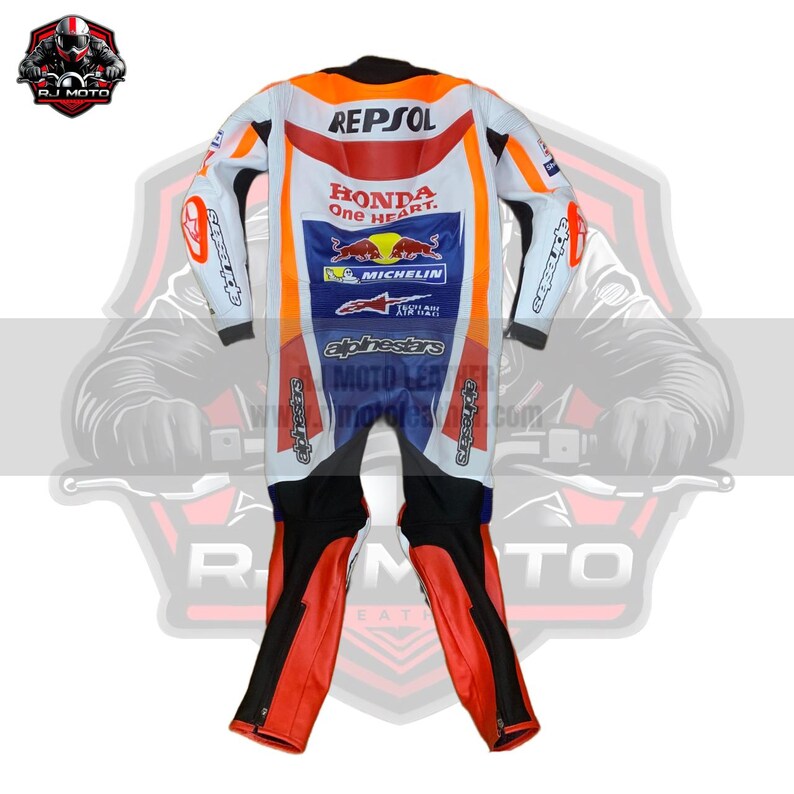 May include: A white, orange, red, blue, and black motorcycle racing suit with sponsor logos, including "REPSOL," "HONDA," and "MICHELIN." The suit features a full-body design with a zipper closure