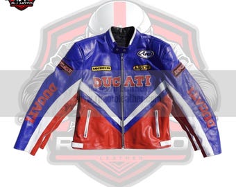 May include: A blue, red, and white leather motorcycle jacket with the word "Ducati" displayed. The jacket has a zip-up front, a stand-up collar, and brand patches. The sleeves have the word "Ducati" printed on them.