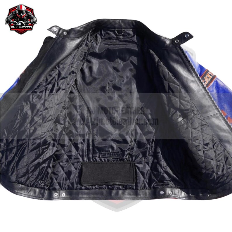 May include: Black leather motorcycle jacket with a quilted black lining. The jacket has a blue and red design on the sleeves and shoulders. The interior features a pocket and the brand logo.