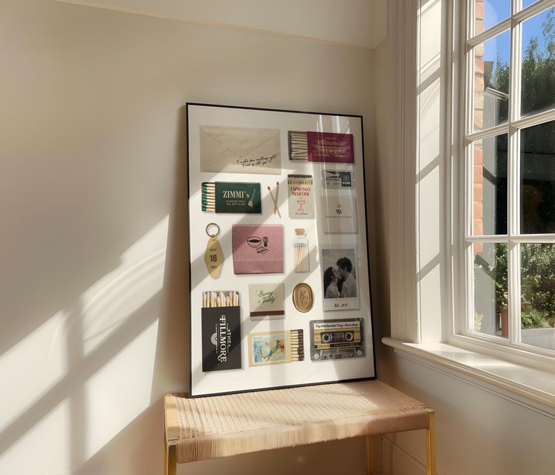 May include: A framed collage of vintage matchboxes, postcards, and other ephemera. The collage includes a matchbox labeled "Zimmi's", a postcard with a bird, and a cassette tape.