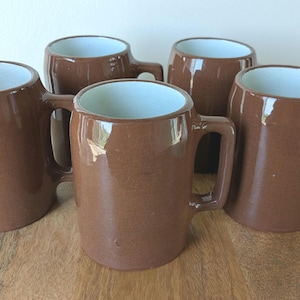 Vintage Buckeye pottery brown mugs set of five
