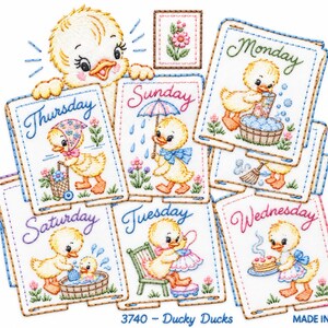 May include: A collection of embroidered fabric squares featuring yellow ducklings performing daily tasks. Each square is labelled with a day of the week, including Monday, Tuesday, Wednesday, Thursday, Saturday, and Sunday. The text 3740 - Ducky Ducks is printed at the bottom.