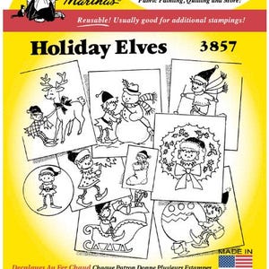 May include: Black and white iron-on transfer sheet with images of holiday elves, a snowman, a reindeer, and a wreath. The sheet is labeled "Holiday Elves" and "3857".