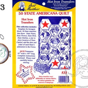 May include: A blue and white package of 50 state Americana quilt hot iron transfers. The package includes a template for a hexagon block, 50 state transfers that show the state name, state flower, state bird, state outline, a star to show the location of the state capitol, and the date and order of each state's admission to the union. The quilt measures 97 inches wide by 107 inches long. The package includes complete instructions.  The package also includes two giant sheets of designs.