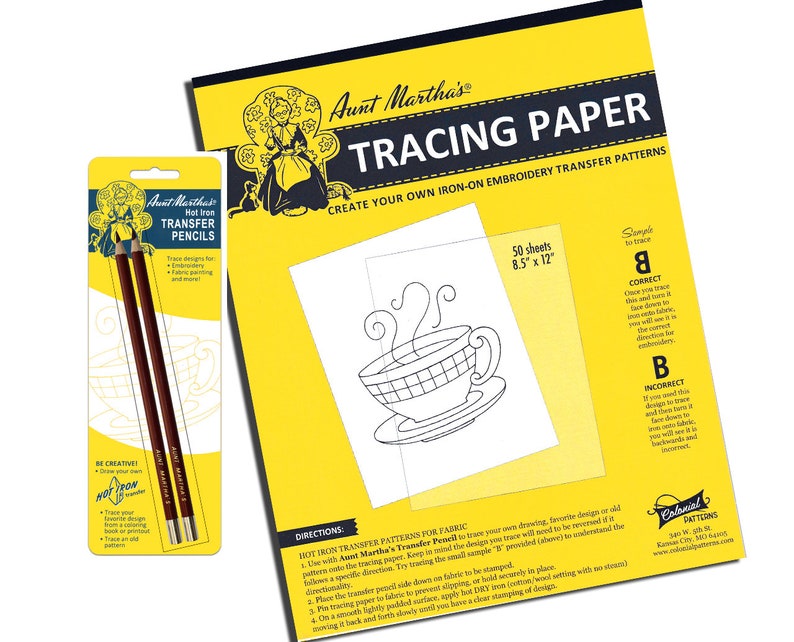May include: A pack of two brown Aunt Martha's Hot Iron Transfer Pencils, a yellow and black package of 50 sheets of 8.5 by 12 inch tracing paper, and a sample design of a teacup with steam coming from it. The tracing paper is for creating iron-on embroidery transfer patterns.
