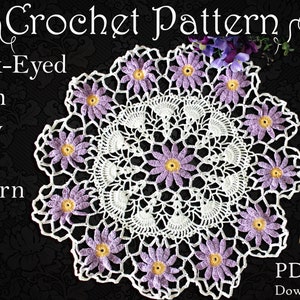 May include: Crochet pattern for a white doily with purple flowers and yellow centers. The pattern is called "Black-Eyed Susan Doily" and is numbered #115. The pattern is available as a downloadable PDF file.