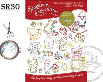 May include: Stitcher's Revolution SR30 Forest Friends iron-on embroidery patterns sheet featuring various woodland animals, insects, and mushrooms. Includes a pair of scissors and an embroidery hoop with a needle and blue floral design.