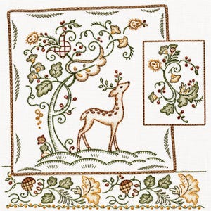May include: An embroidery pattern on white fabric featuring a central deer standing under a stylized tree with red berries and green leaves. A smaller floral motif is on the right, and a decorative border with leaves and berries runs along the bottom.