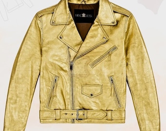 May include: A metallic gold leather jacket with a classic asymmetrical zip closure, featuring multiple zippered pockets, a belted waist, and the brand name "HIDE SEEK" on the label. The jacket has a notched collar and a shiny finish.