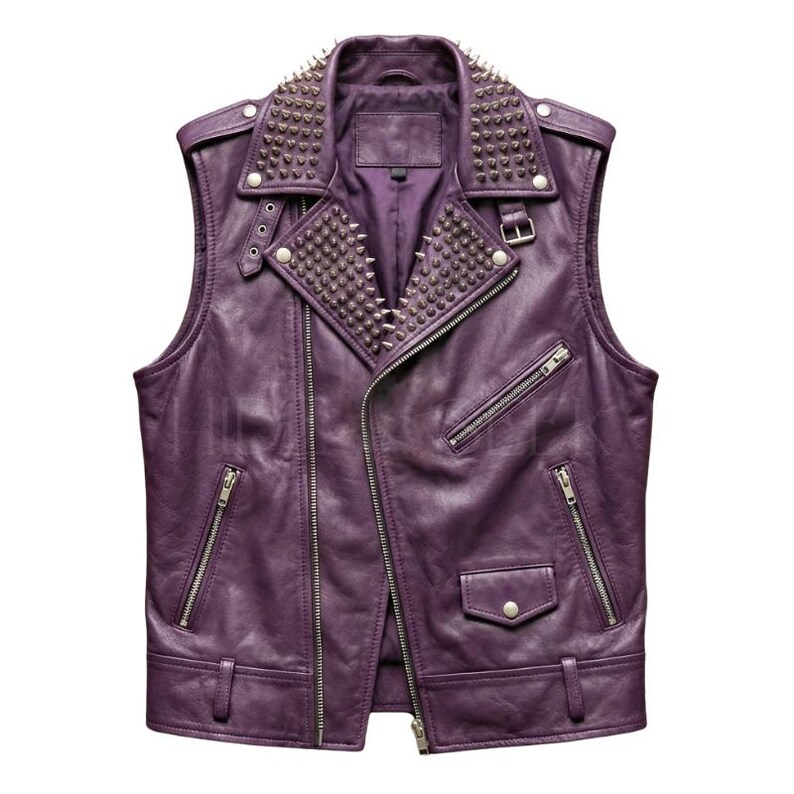 May include: A sleeveless purple leather vest with silver metal studs on the collar and lapel. The vest features a diagonal zipper closure, multiple zippered pockets, and a small snap pocket. The vest has a classic biker jacket design.