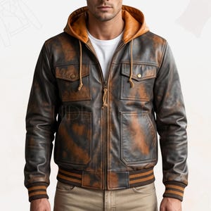 May include: A distressed brown and black leather jacket with an orange hood and lining. The jacket features a zip-up front, two chest pockets, and two lower pockets. The cuffs and waistband have brown and orange striped detailing.