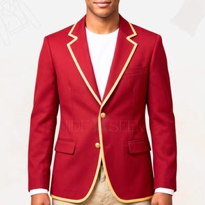 May include: A red blazer with gold trim and two gold buttons. The blazer has two front pockets and a breast pocket. The text "HIDE SEEK" is visible on the blazer. The blazer is worn over a white shirt.