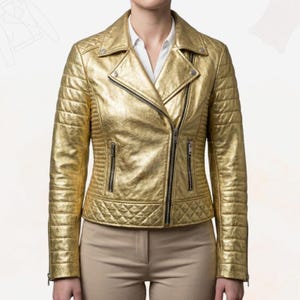 May include: A gold metallic biker jacket with quilted detailing on the shoulders, sleeves, and lower front. It has a diagonal zip, two zipped pockets, and a notched collar. This jacket is a fashionable outerwear item.