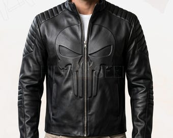 May include: Black leather jacket with a skull emblem embossed on the chest. The jacket features a stand-up collar, a full-length zipper, and quilted shoulder detailing. The jacket is a classic biker style.