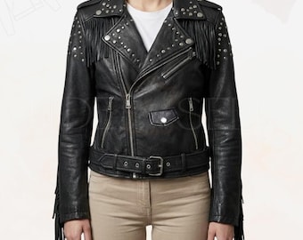 May include: Black leather jacket with silver studs and fringe detailing. The jacket features an asymmetrical zipper closure, a belted waist, and multiple pockets. A classic biker-style jacket.