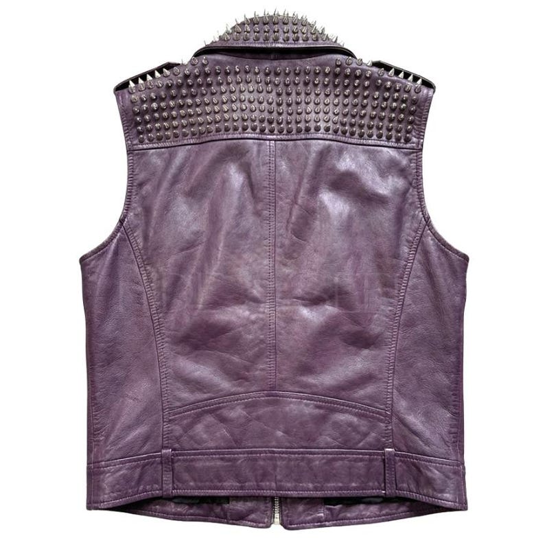 May include: A purple leather vest with a studded collar. The back of the vest is visible, showcasing the stitching and design. The vest has a zipper closure and a fitted silhouette, perfect for a rock and roll aesthetic.