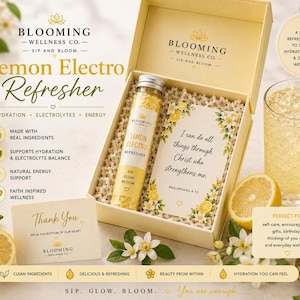 May include: A gift box containing a glass tube of Lemon Electro Refresher powder and a card with the text I can do all things through Christ who strengthens me. The set includes a Thank You note, lemons, and a glass of yellow liquid.