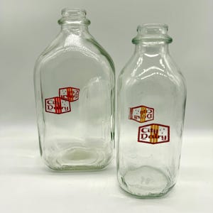 Pair of Vintage City Dairy Milk Bottles