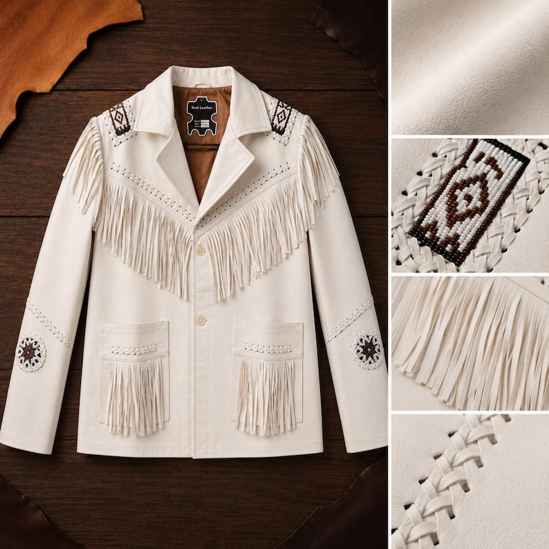 May include: An off-white leather jacket featuring long fringe detailing across the chest and pockets. The garment includes intricate braided leather accents and beaded geometric patches on the shoulders and sleeves, with a brown interior lining.
