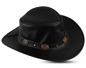 May include: A black leather cowboy hat with a wide brim and decorative metal accents.