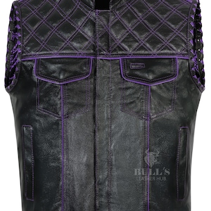 May include: Black leather vest with purple diamond stitching and trim. Features two front pockets and decorative purple accents on the shoulders. The vest has a stand-up collar and a button-up front. The Bull's Leather Hub logo is visible.