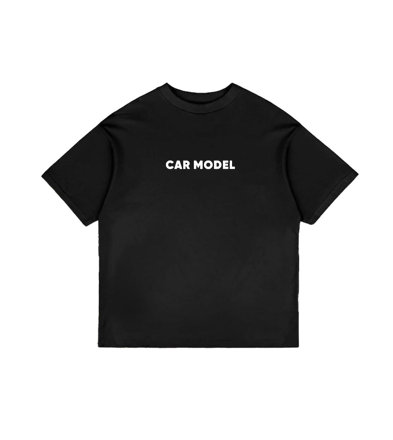 May include: Black t-shirt with the white text "CAR MODEL" centered on the chest. The shirt has short sleeves and a crew neck. The fabric appears to be a soft, opaque material.