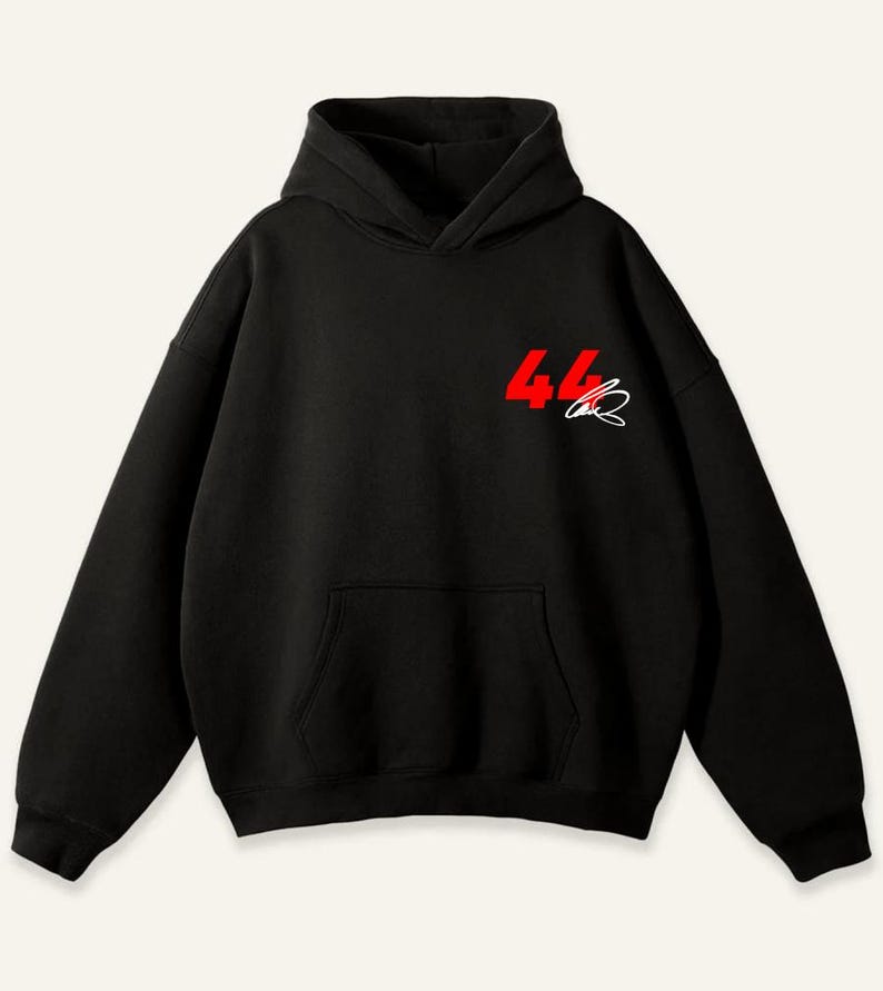 May include: Black hoodie with a front kangaroo pocket and a hood. The number "44" is printed in red on the upper left chest, with a white signature below it. The hoodie is made of a soft material.
