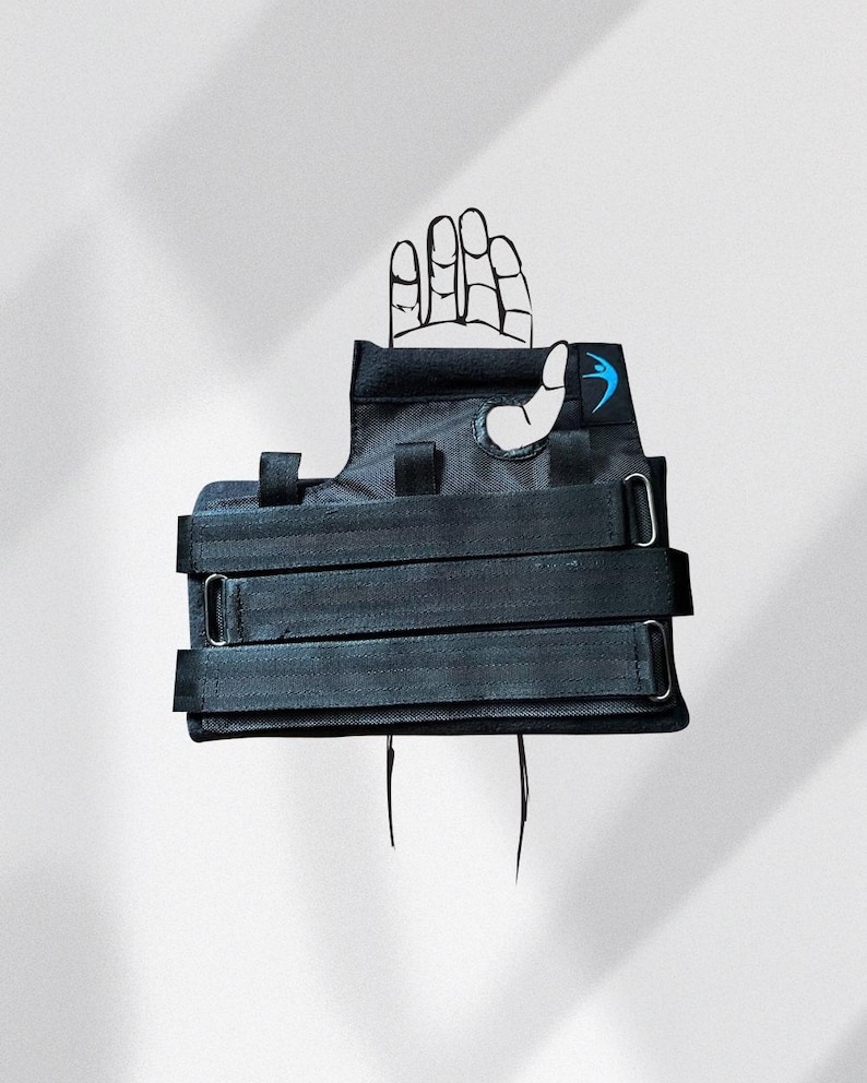 May include: Black wrist brace with three adjustable straps and metal buckles. A blue logo is visible on the brace. A hand illustration is partially visible above the brace.