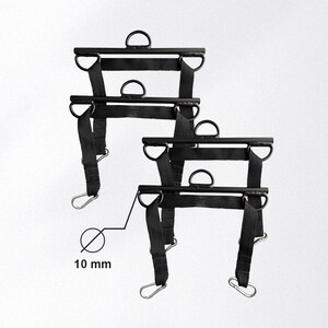 May include: Two black weightlifting attachments with D-rings and carabiner clips. Each attachment has a 10 mm diameter. The attachments are designed for use with weightlifting equipment.