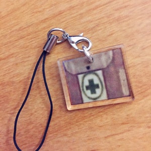Tomb Raider - Large Medipack - Acrylic Phone Charms