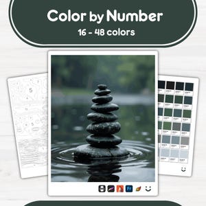 Puede incluir: Un kit de pintura por números con una imagen serena de piedras apiladas en el agua. El kit incluye una guía numerada, el lienzo para pintar y una paleta de colores con 16-48 colores. El texto "Color by Number" y "16 - 48 colors" se muestra en la parte superior.
