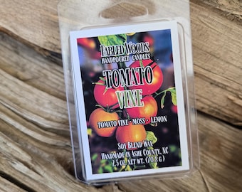 Pastillas de cera aromáticas con aroma a tomate y almizcle natural en envase tipo concha.