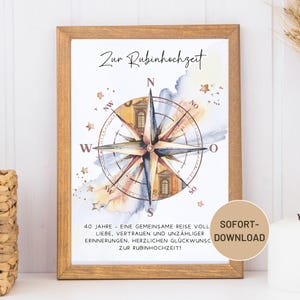 May include: A framed print featuring a watercolour compass rose in blue, yellow, and brown tones. The German text "Zur Rubinhochzeit" is at the top. Additional text includes "40 Jahre - Eine gemeinsame Reise voll Liebe..." and "SOFORT-DOWNLOAD".