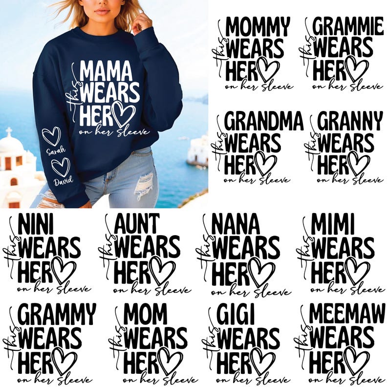 May include: Navy blue sweatshirt with the text "MAMA WEARS HER" and a heart design. The sleeve features the names "Sarah" and "David" inside hearts. Additional designs include "MOMMY WEARS HER" and "GRAMMIE WEARS HER".